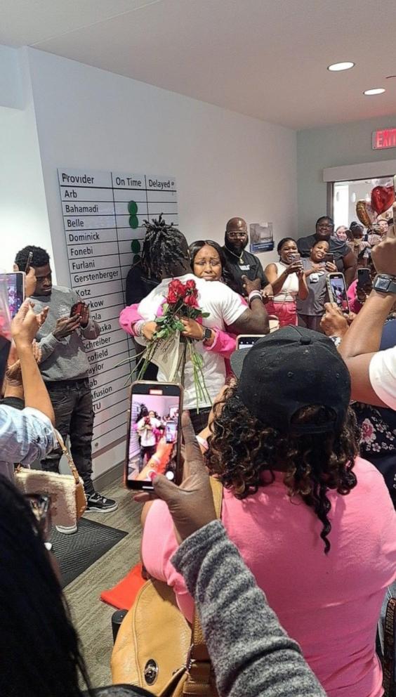 PHOTO: May and Watkins were surrounded by family and friends to celebrate May finishing chemotherapy and the couple’s engagement.