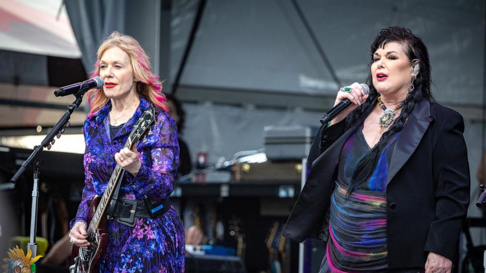 PHOTO: In this April 28, 2024, file photo, Ann Wilson (R) and Nancy Wilson (L) of Heart perform during the New Orleans Jazz & Heritage Festival 2024, at Fair Grounds Race Course, in New Orleans.