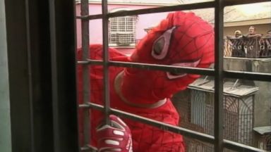 VIDEO: Gaurav Sharma dresses as superhero and climbs buildings as part of his campaign in India's parliamentary elections.