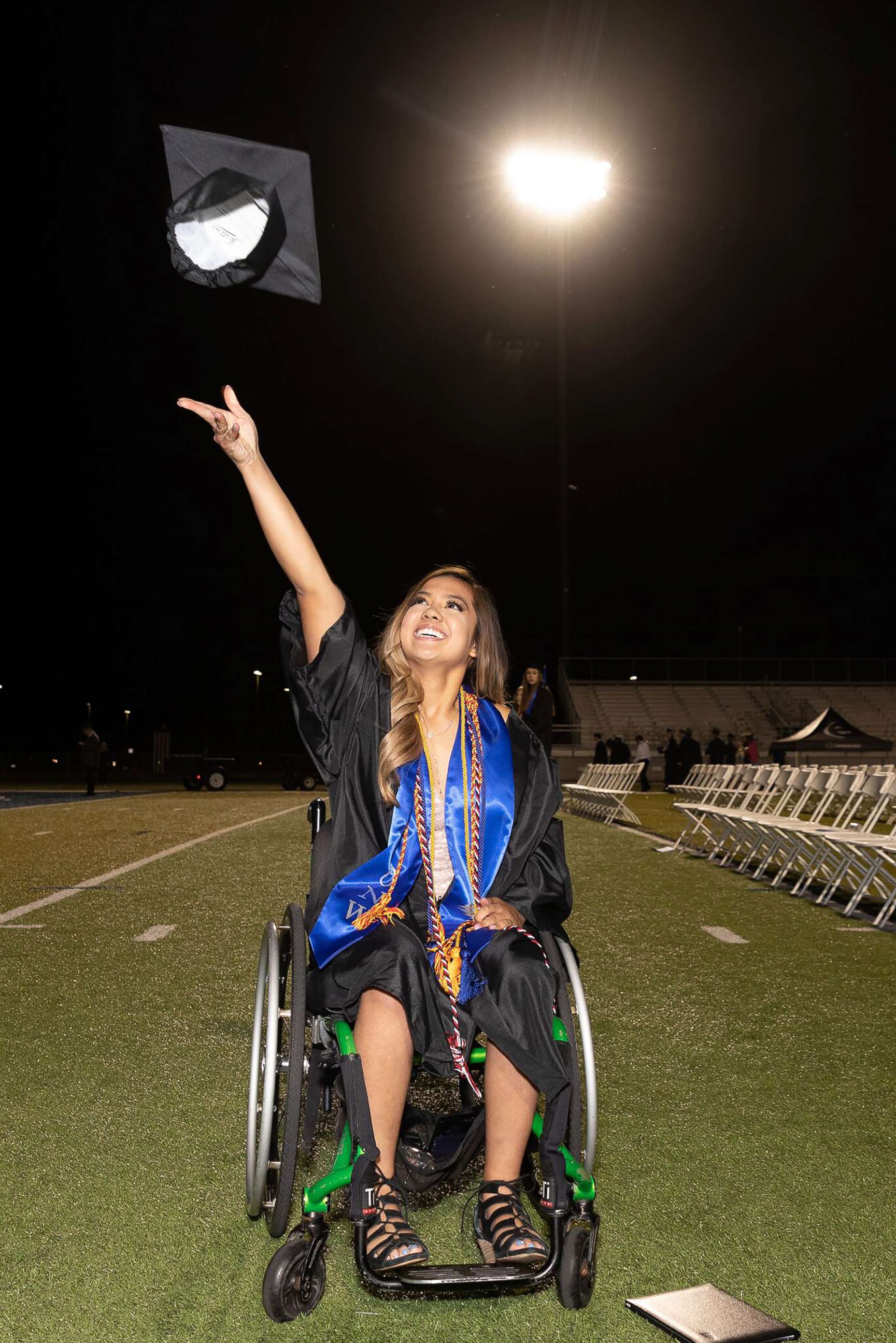 PHOTO: Anna Sarol walked for the first time in years across her graduation stage to receive her diploma. 