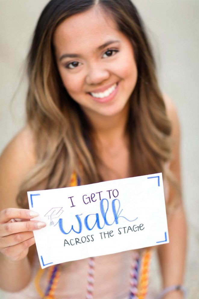 PHOTO: Anna Sarol walked for the first time in years across her graduation stage to receive her diploma. 