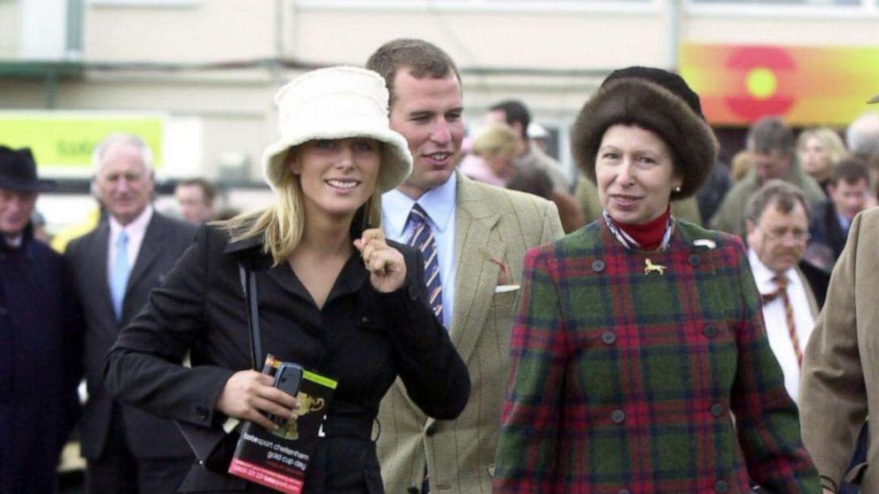 PHOTO: Princess Anne (right) with her children Zara and Peter Phillips at Cheltenham Race Course, on the third and final day of the Cheltenham Festival meeting, in Cheltenham, England, March 18, 2004. 