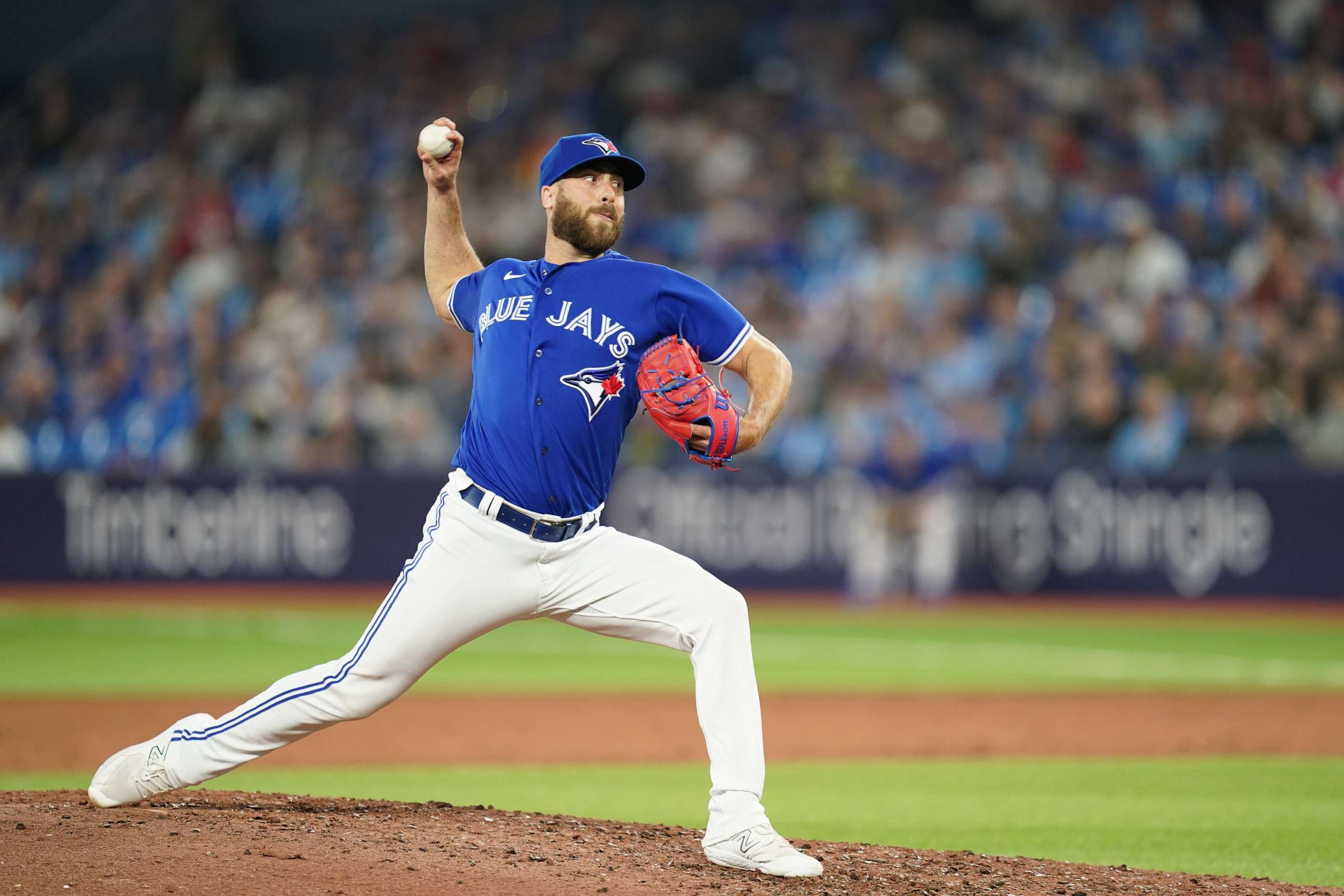 PHOTO: Anthony Bass of the Toronto Blue Jays pitches during a game Apr. 11, 2023 in Toronto, Canada.