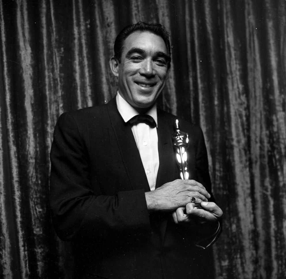 PHOTO: In this March 27, 1957, file photo, Anthony Quinn poses with his Oscar for Best Supporting Actor for "Lust for Life" during the Academy Awards in Los Angeles.