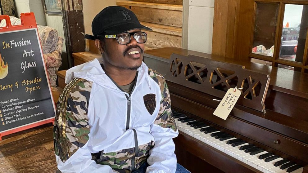 PHOTO: On July 11, 23-year-old John Thomas Archer asked employees at ReMARKable Cleanouts in Norwood, Massachusetts, permission to play a piano that was out on display.