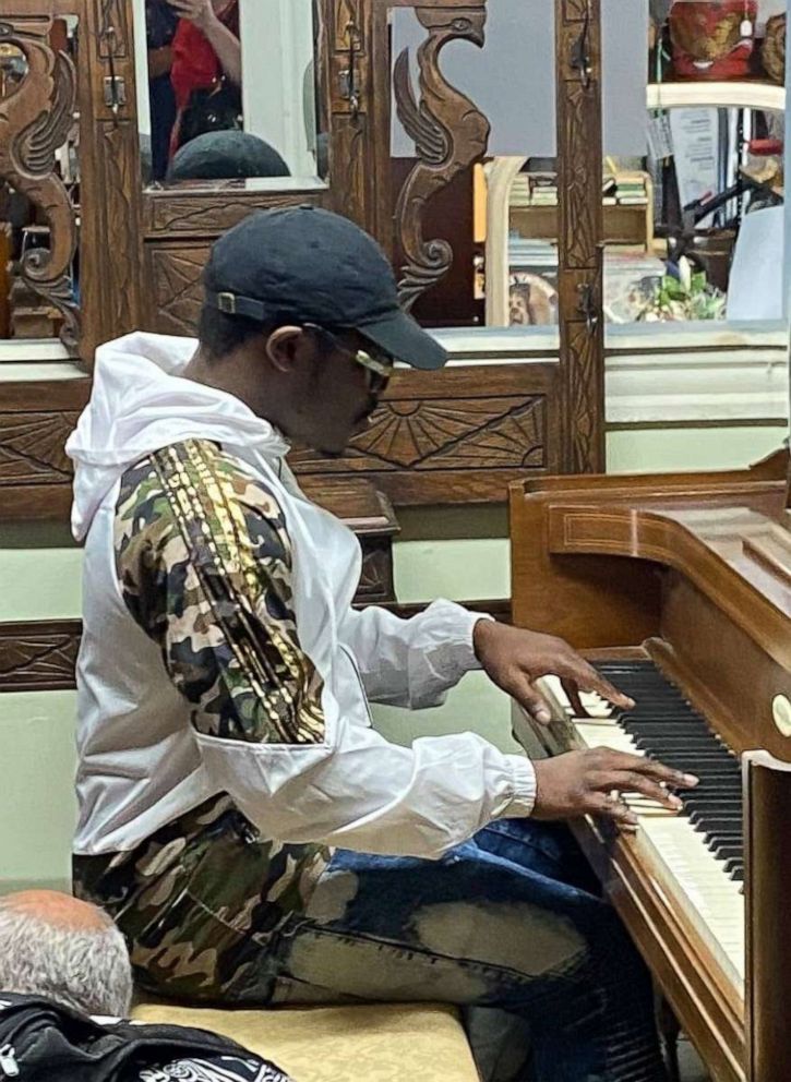 PHOTO: John Thomas Archer, 23, wowed employees and customers at ReMARKable Cleanouts in Norwood, Massachusetts after playing Journey's "Don't Stop Believin.'"