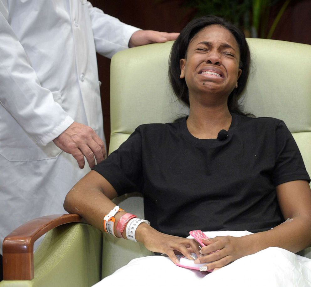 PHOTO: Patience Carter, a victim in the Pulse nightclub shooting from Philadelphia, becomes emotional after giving her story during a news conference at Florida Hospital Orlando, June 14, 2016, in Orlando, Fla.