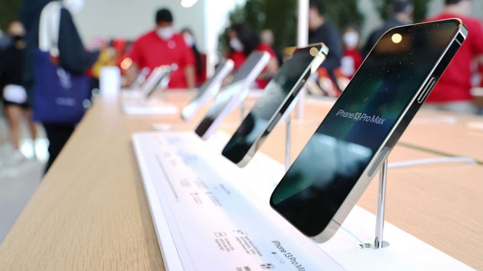 In this Nov. 19, 2021, file photo, iPhones are displayed at an Apple store in Los Angeles.
