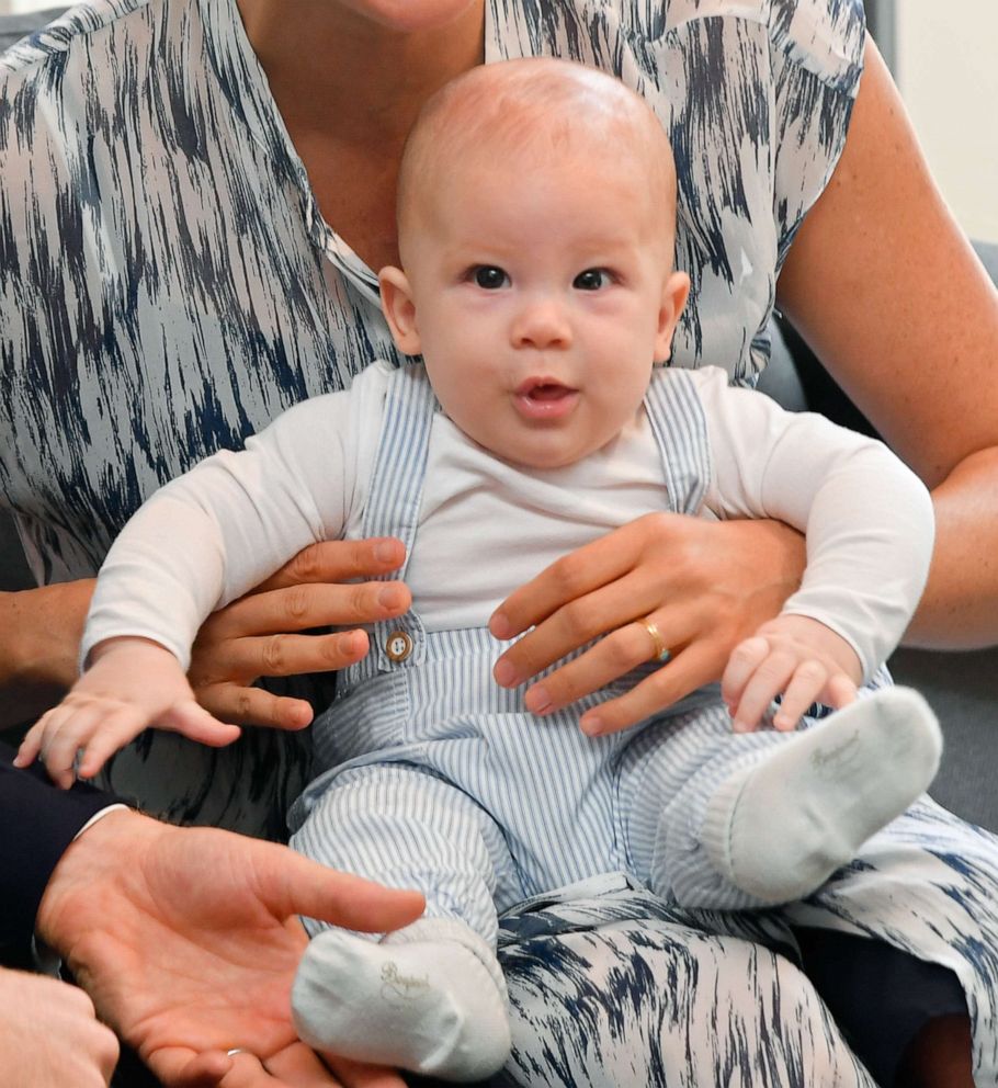 PHOTO: Archie Mountbatten-Windsor is held by his mother Meghan, Duchess of Sussex during a meeting with Archbishop Desmond Tutu and his daughter Thandeka Tutu-Gxashe during their royal tour of South Africa, Sept. 25, 2019, in Cape Town, South Africa.