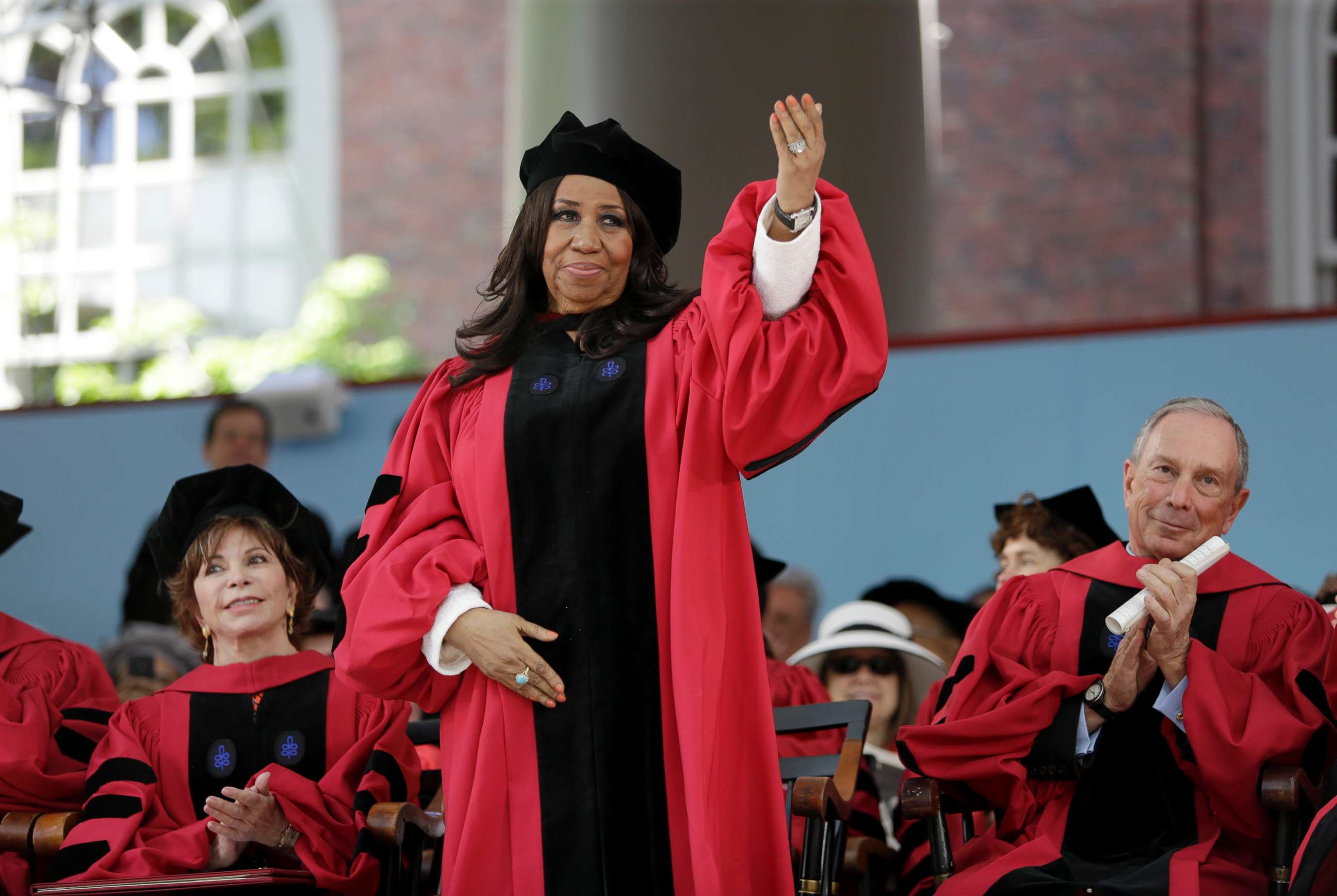 PHOTO: Aretha Franklin waves as she receives an honorary Doctor of Arts degree during Harvard commencement ceremonies in Cambridge, Mass, May 29, 2014.