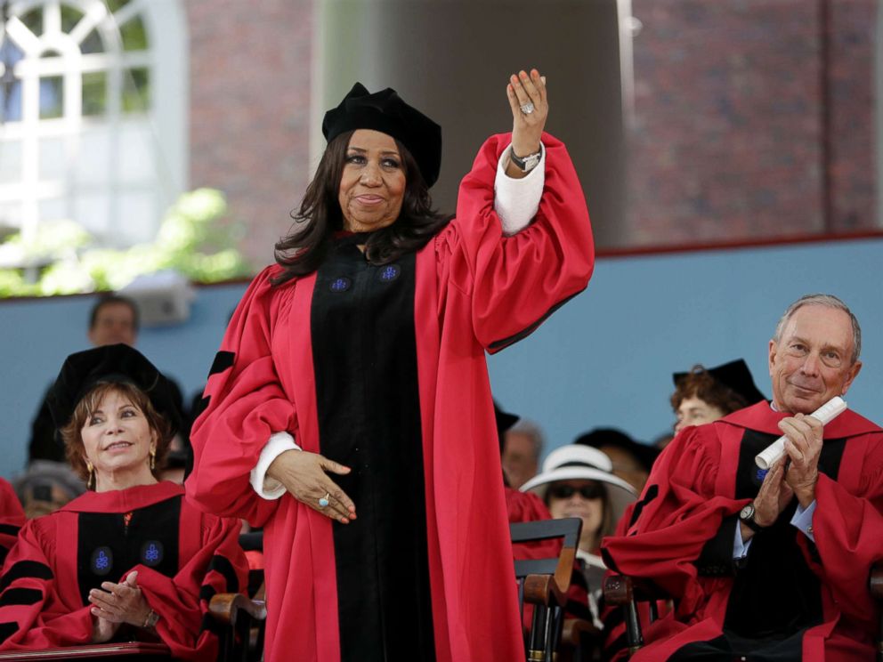 PHOTO: Aretha Franklin waves as she receives an honorary Doctor of Arts degree during Harvard commencement ceremonies in Cambridge, Mass, May 29, 2014.