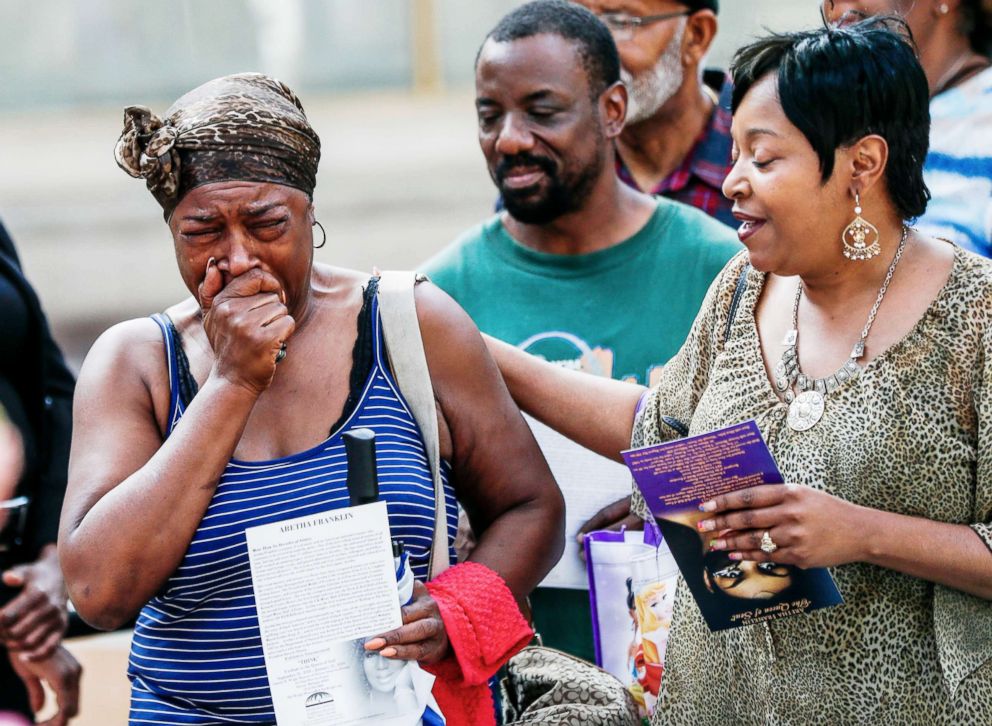 PHOTO: A woman weeps as she views the open casket containing the body of Aretha Franklin during a public viewing at the Charles H. Wright Museum of African American History in Detroit, Aug. 28 2018.