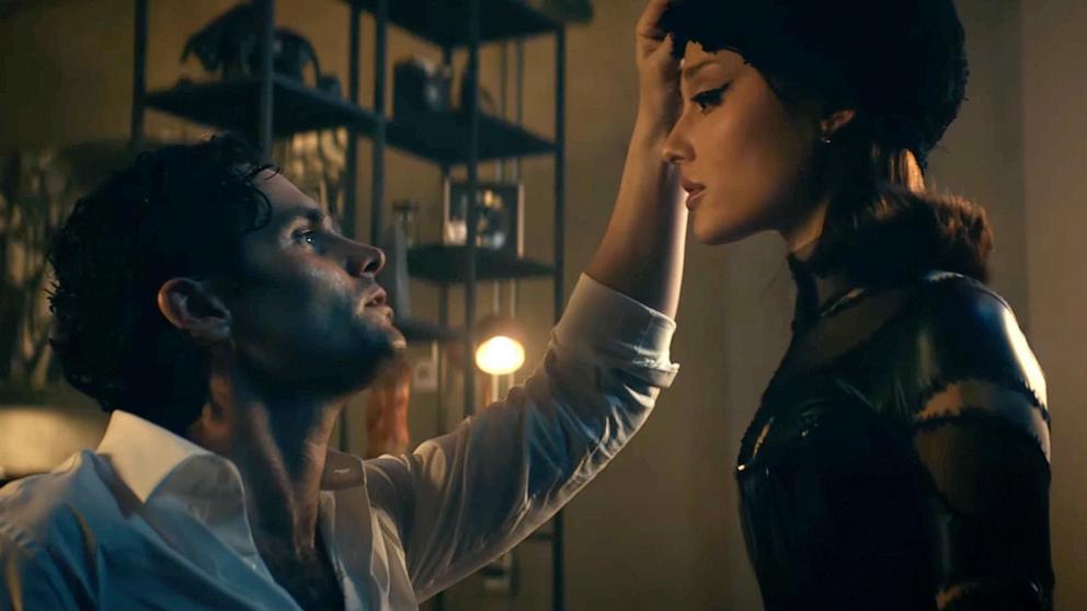 PHOTO: Ariana Grande and Penn Badgley appear in Grande's new music video "the boy is mine."