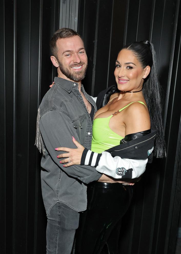 PHOTO: In this Feb. 8, 2023, file photo, Artem Chigvintsev and Nikki Bella attend Brie and Nikki Bella's live edition of SiriusXM's The Bellas Podcast in Phoenix, Arizona.