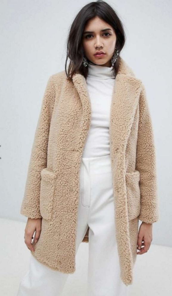 PHOTO: Resistance is futile against this tidy teddy coat. Style Hint: This trim layer can literally be worn with everything, but it looks best with essential staples: Clean corduroys and retro turtlenecks.