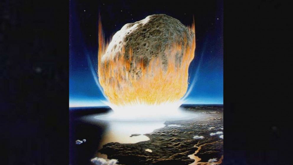 PHOTO: An artist’s interpretation of the asteroid impact that wiped out all non-avian dinosaurs.