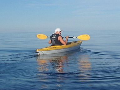 VIDEO: A shark knocked the two women into water while they were kayaking off the coast of Massachusetts.