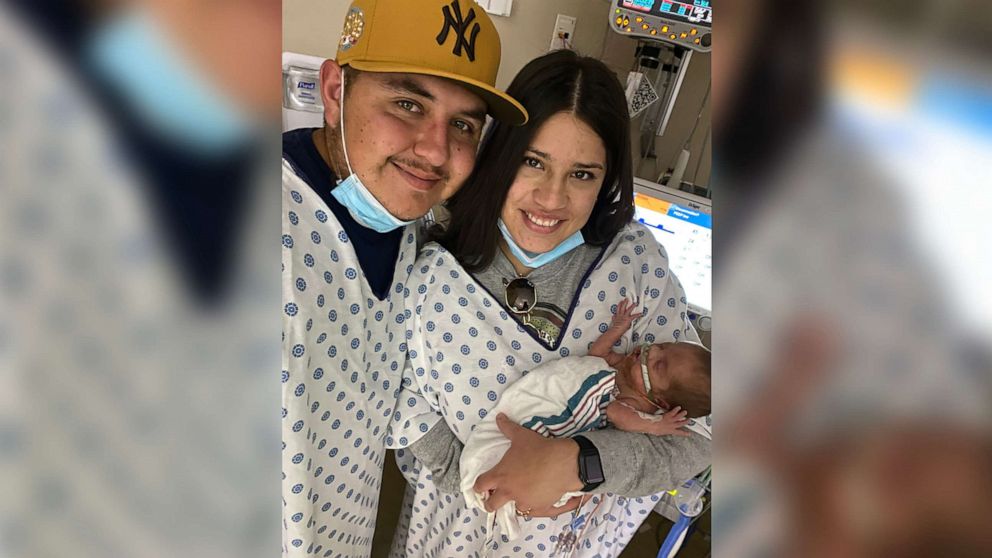 Abigail and Dominic Miramontez are pictured with their son Austin at Providence Children's Hospital in El Paso, Texas, in an undated handout photo.