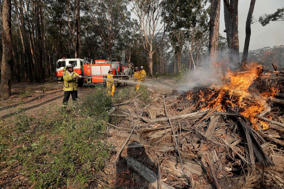 PHOTO: Firefighters battles a fire near Bendalong, Australia, Jan. 3, 2020.