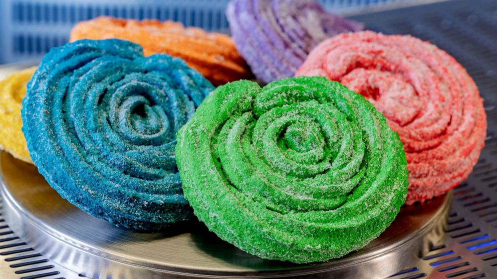 PHOTO: Terran Treats on the Avengers Campus features a menu of intergalactic eats, including colorful Sweet Spiral Ration Churros with unique flavors.