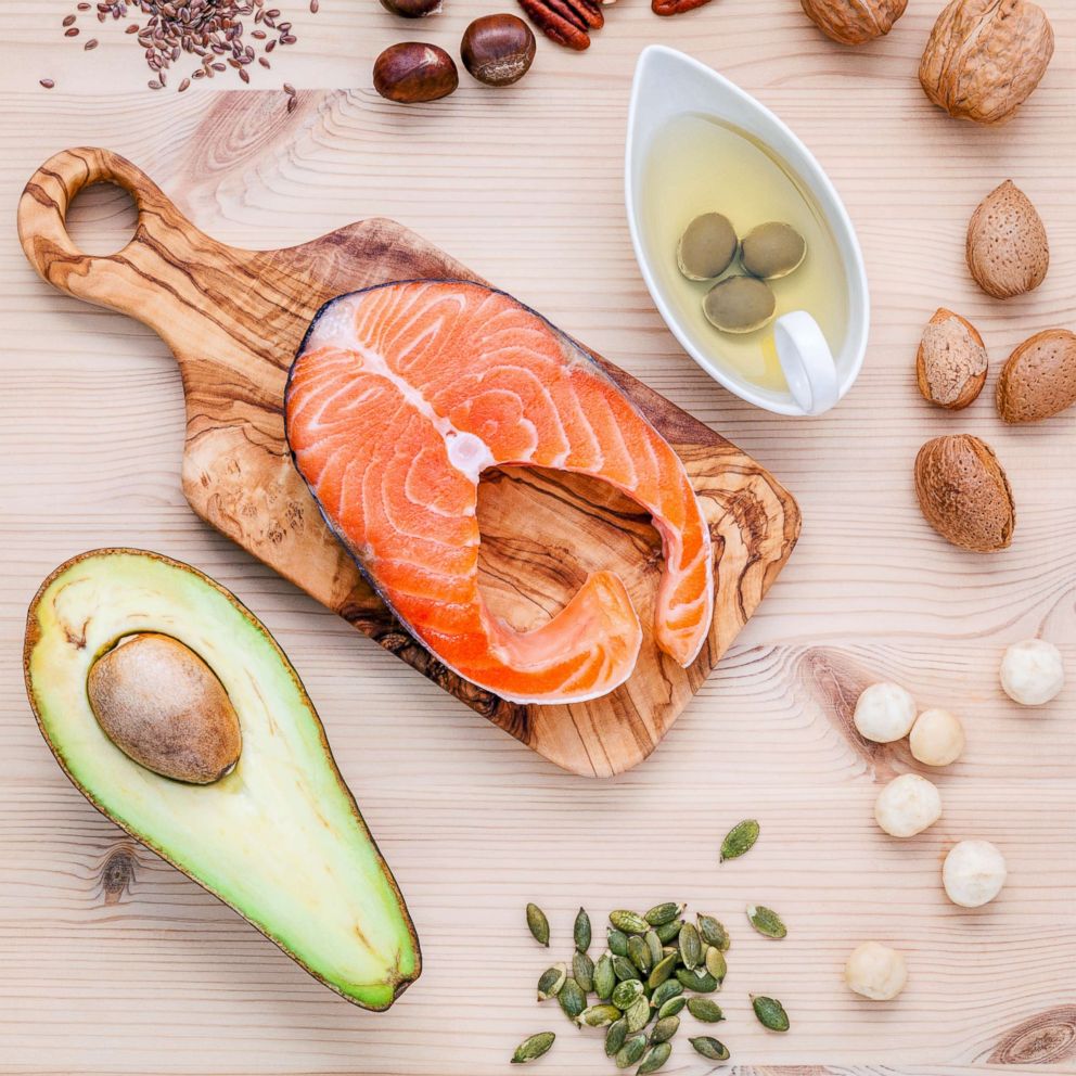 PHOTO: A selection of food sources of Omega-3 and unsaturated fats including various nuts, olive oil, salmon and avocado are pictured in this undated stock photo.