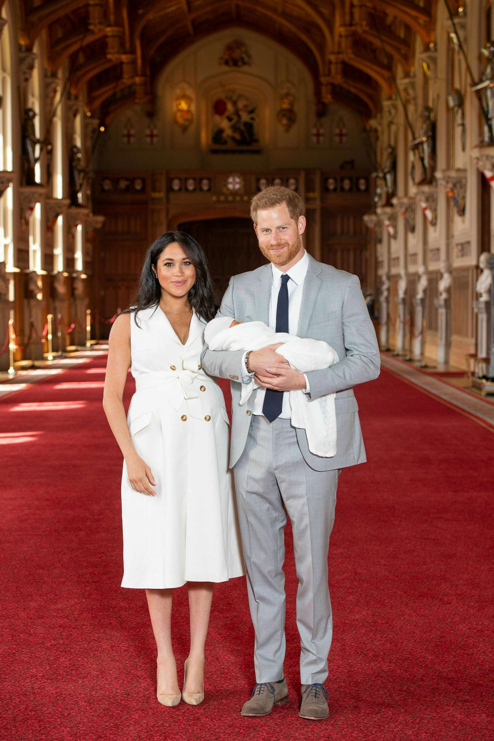 PHOTO: Prince Harry and Meghan, Duchess of Sussex, pose for photographers with their newborn son, in St George's Hall at Windsor Castle, Windsor, England, May 8, 2019.