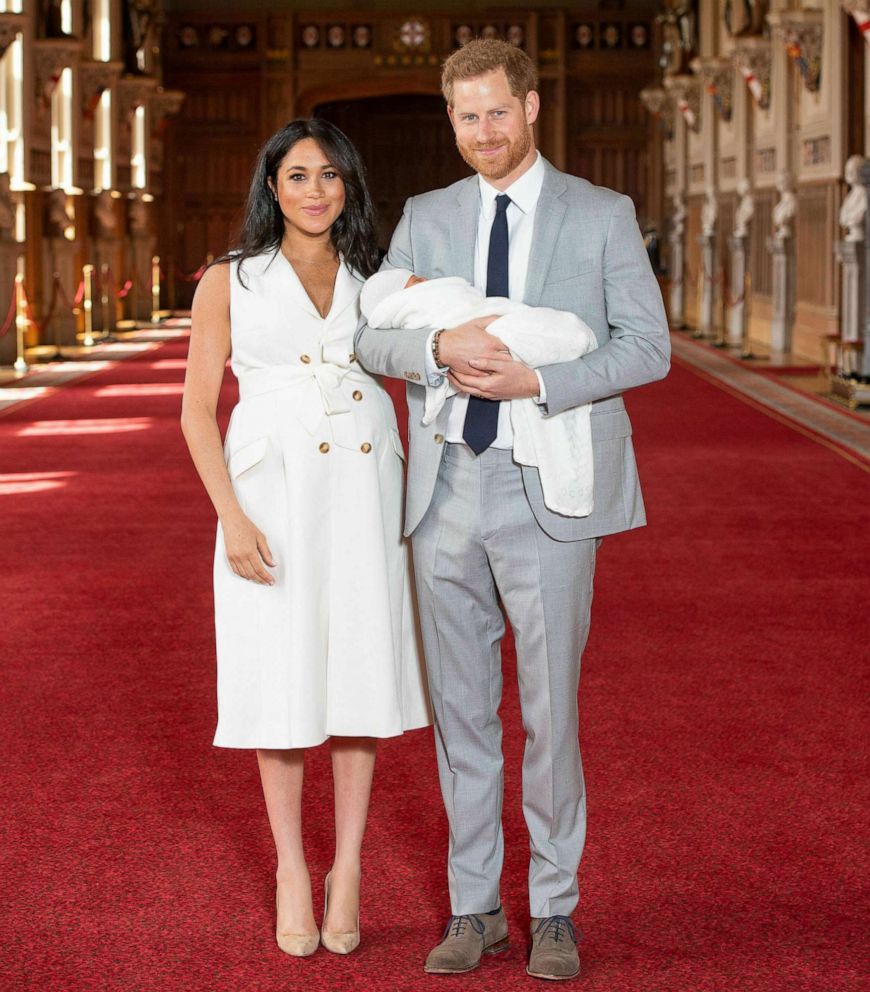 PHOTO: Prince Harry and Meghan, Duchess of Sussex, pose for photographers with their newborn son, in St George's Hall at Windsor Castle, Windsor, England, May 8, 2019.