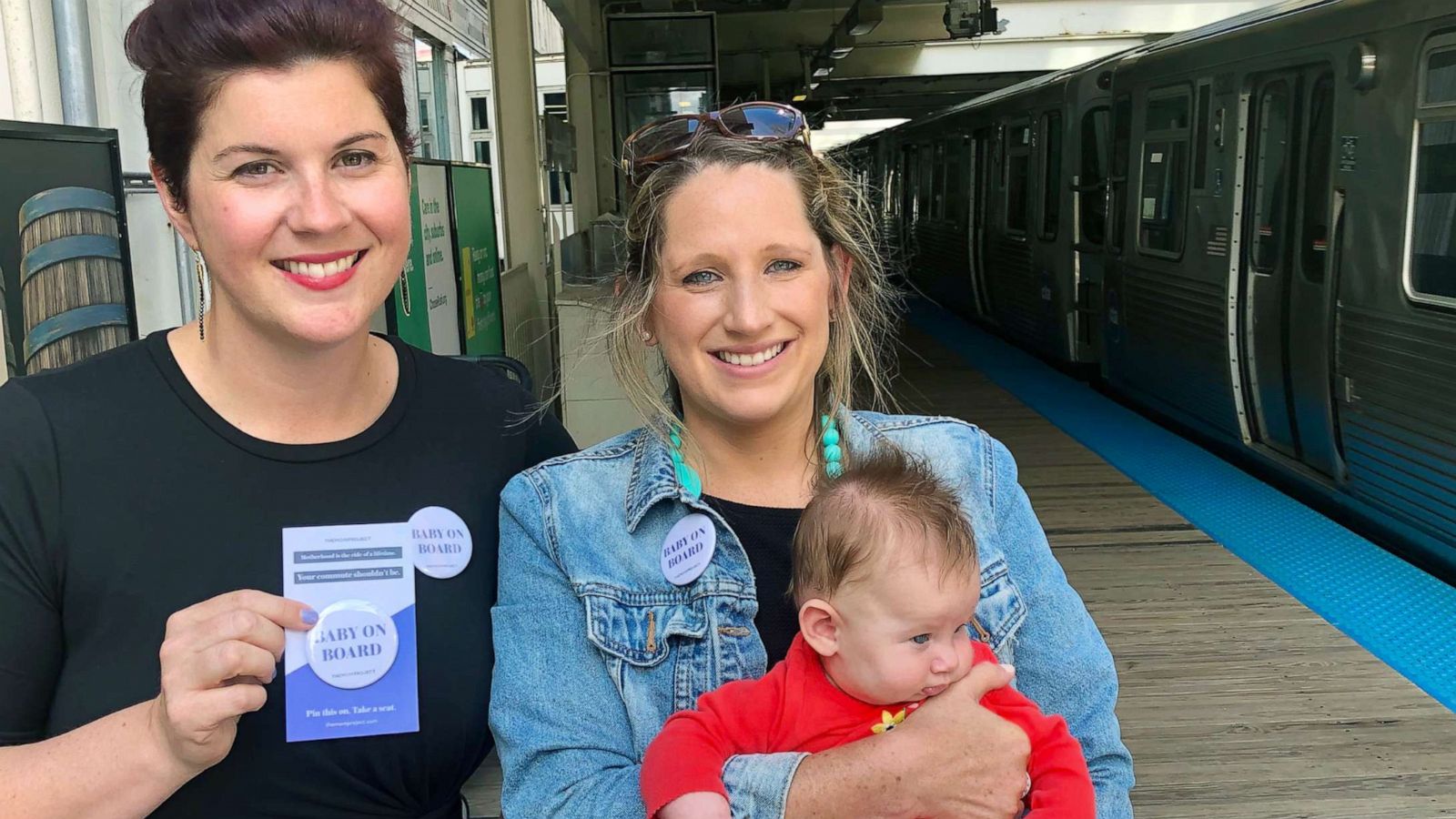 PHOTO: Colleen Curtis, left, and Megan Nufer with her three-month-old daughter Charlotte at the CTA’s Merchandise Mart stop Wednesday. Both young mothers are wearing Baby on Board buttons made by The Mom Project.