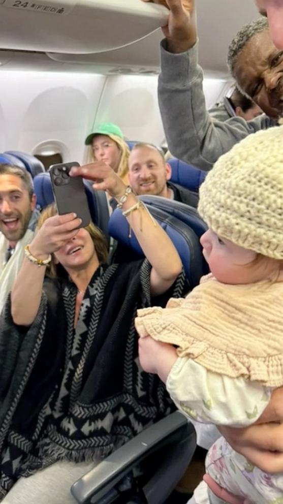 VIDEO: Stranger crochets a hat for the baby seated next to her on her flight