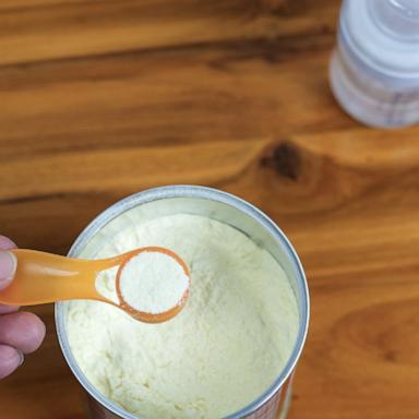 PHOTO: Stock photo of baby formula powder being prepared.