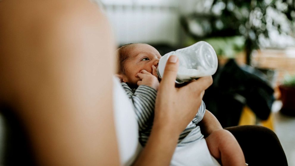 PHOTO: An infant is fed baby formula in an undated stock image.