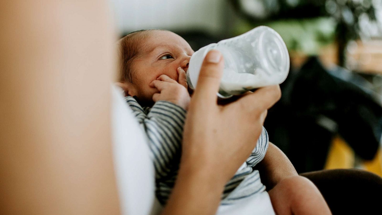 PHOTO: An infant is fed baby formula in an undated stock image.