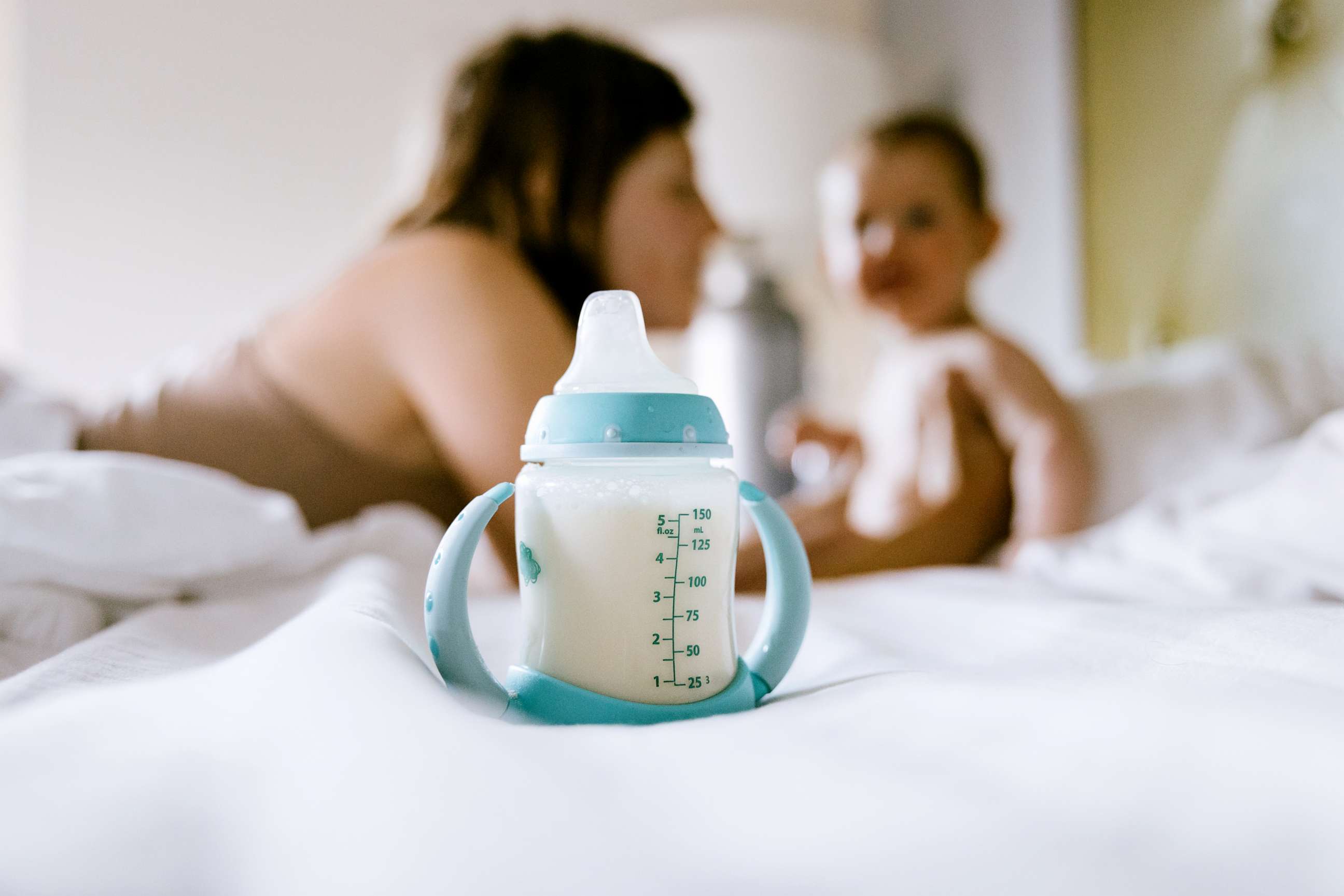 PHOTO: Stock photo of a bottle on a bed.