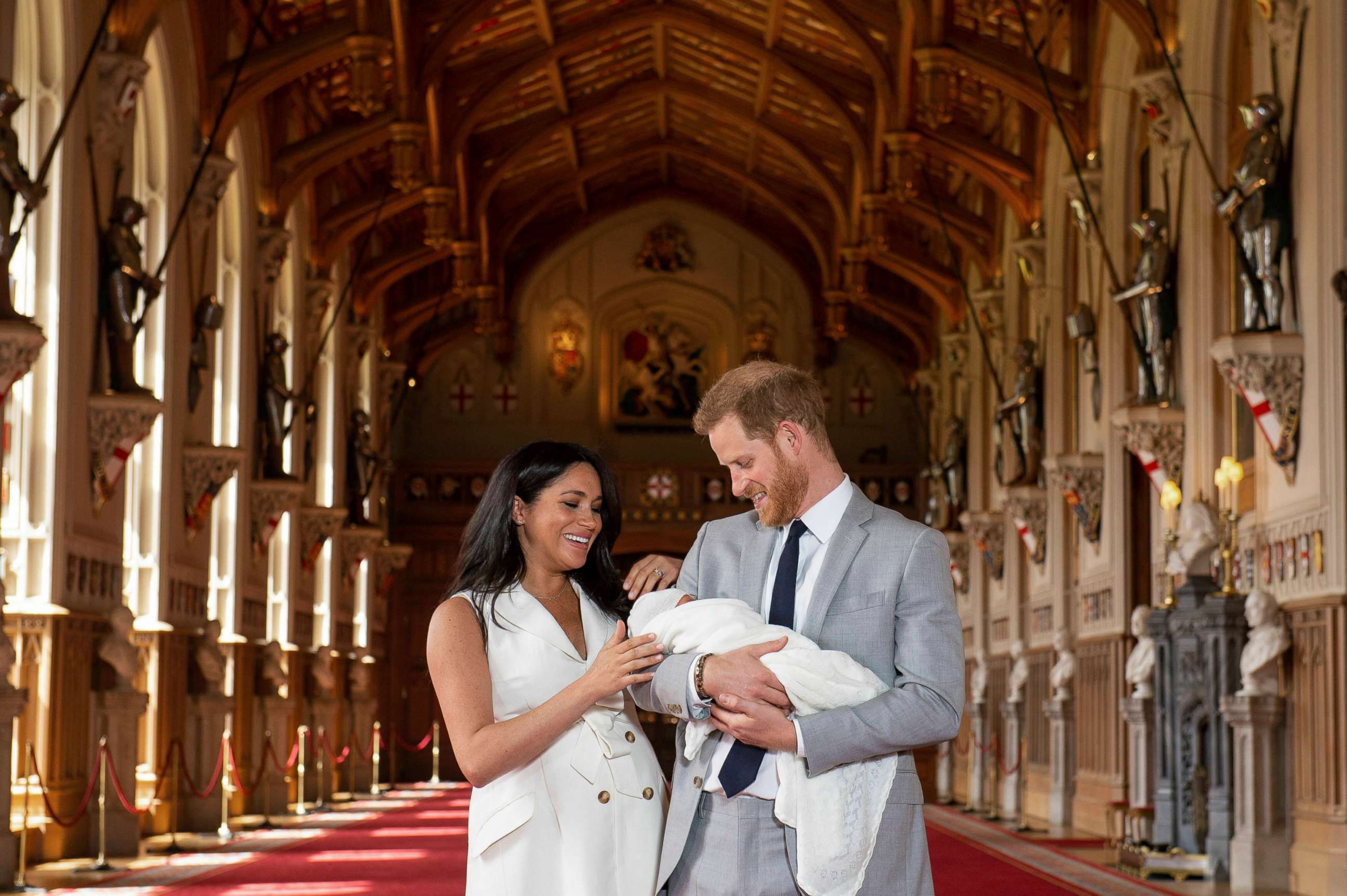 PHOTO: Britain's Prince Harry and Meghan, Duchess of Sussex, hold their newborn son, in St. George's Hall at Windsor Castle, Windsor, England, May 8, 2019.