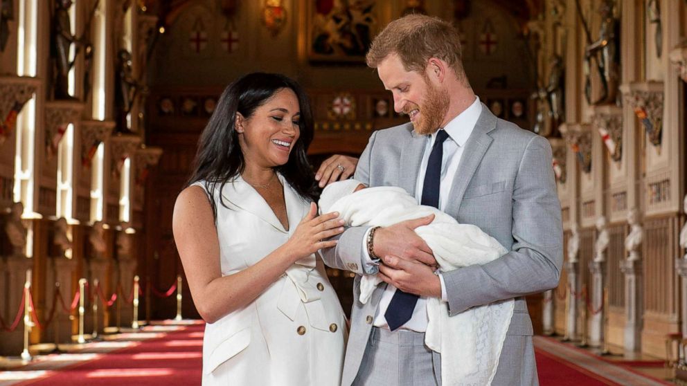 PHOTO: Britain's Prince Harry and Meghan, Duchess of Sussex, hold their newborn son, in St. George's Hall at Windsor Castle, Windsor, England, May 8, 2019.