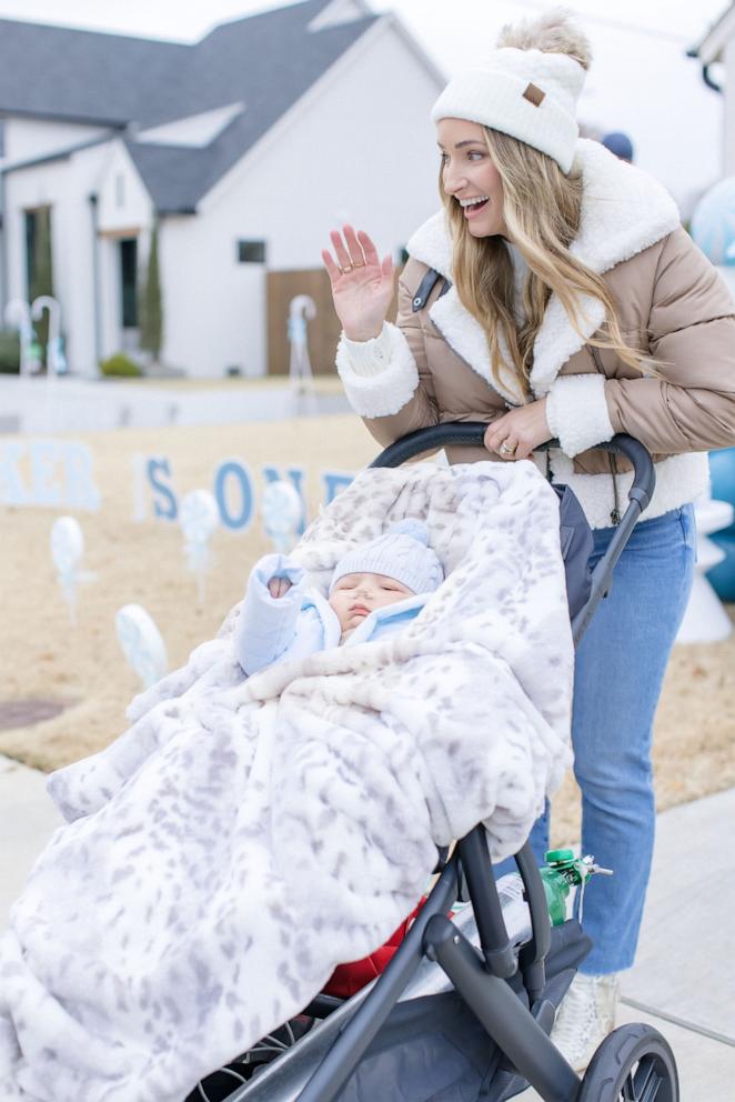 PHOTO: Parker Helmerich and his mom Faith wave to friends at a drive-by celebration for Parker’s first birthday.