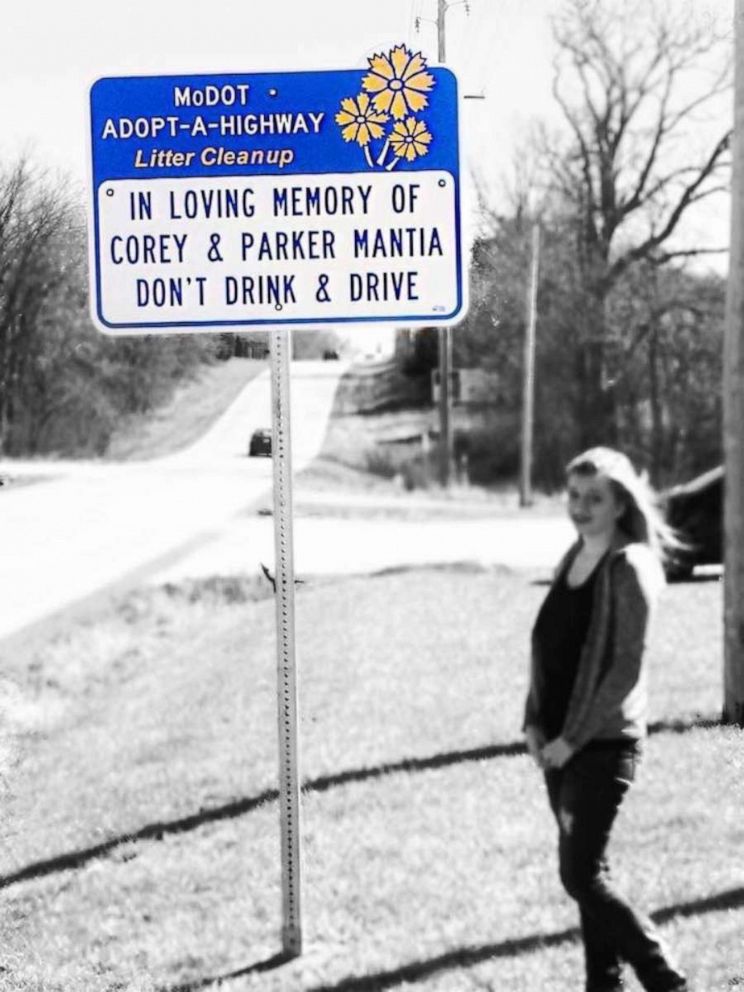 PHOTO: Destiny Klimaszewski stands beside a street sign on the stretch of road where her late husband Corey Mantia and their son Parker Mantia, 1, were killed in an alcohol related crash in 2014.