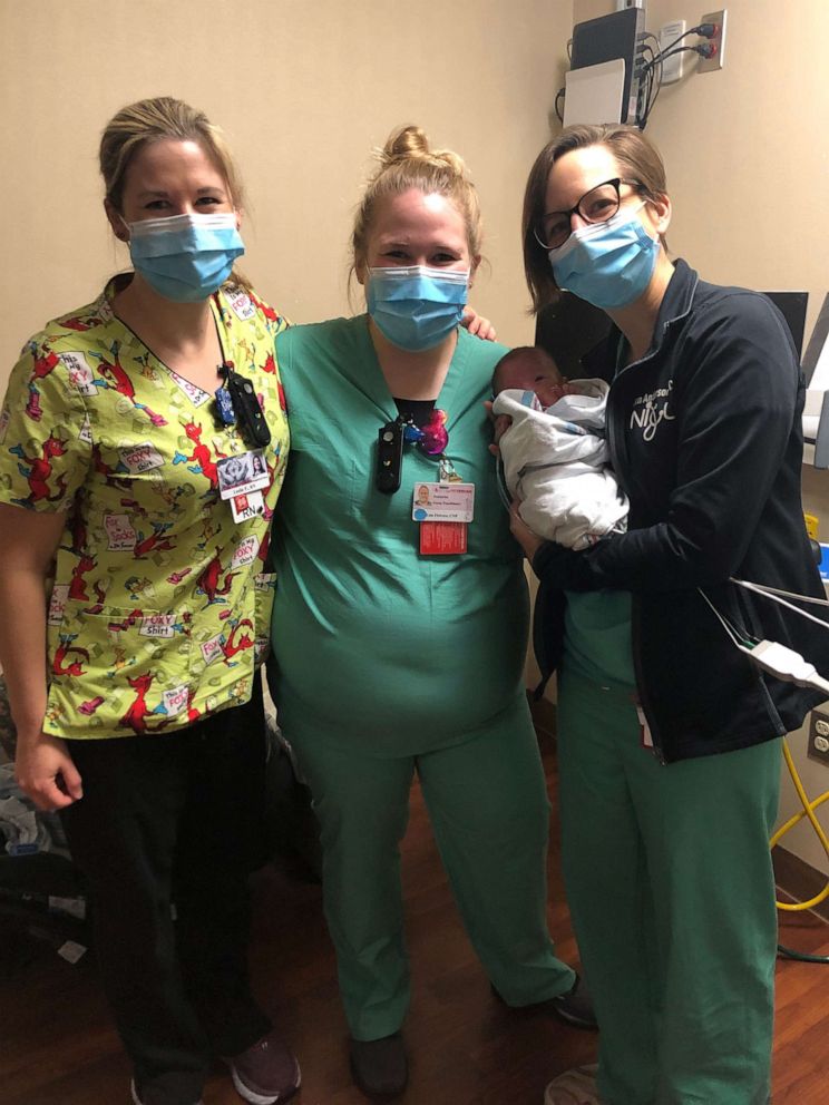 PHOTO: Dr. Jennifer Anderson and care team with baby Jari at 4 months. Jari stayed in the NICU for 127 days before he could go home in June 2021.