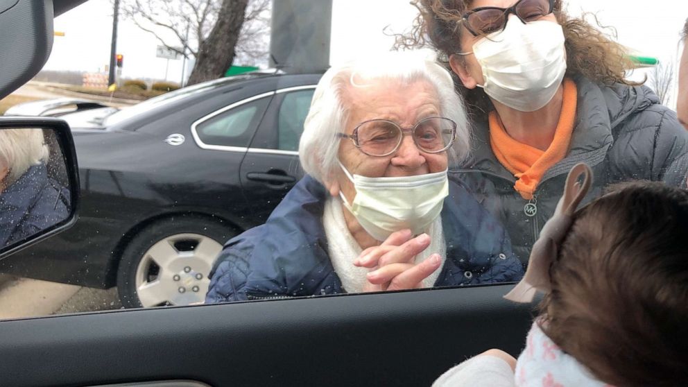 PHOTO: Ross and Maggie Oberschlake, parents of 6-week-old Emma, brought their daughter to a parking lot in Pleasant Prairie, Wisconsin, to greet grandma Janina for the first time.