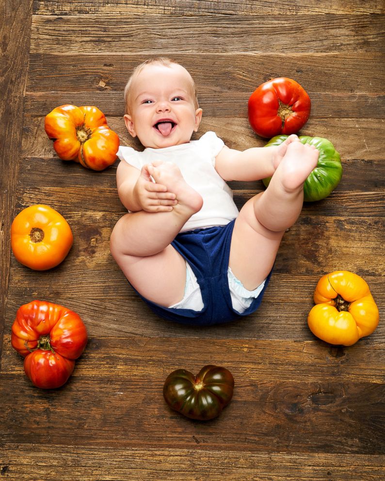 PHOTO: Michaela Claire Meter at seven months old with seven heirloom tomatoes. 