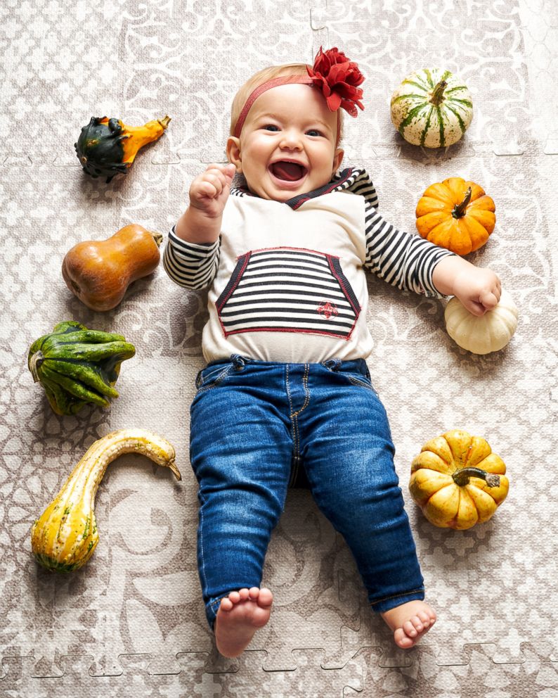 PHOTO: Michaela Claire Meter at eight months old with eight pumpkins and squash.