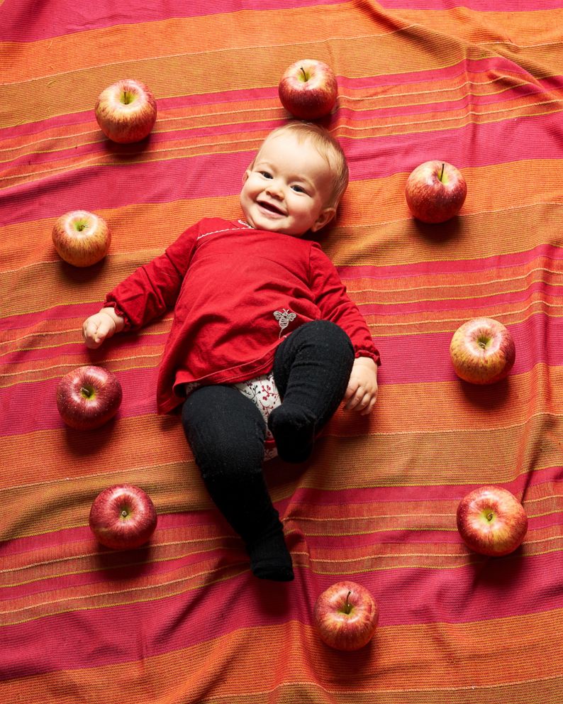 PHOTO: Michaela Claire Meter at nine months old with nine apples.