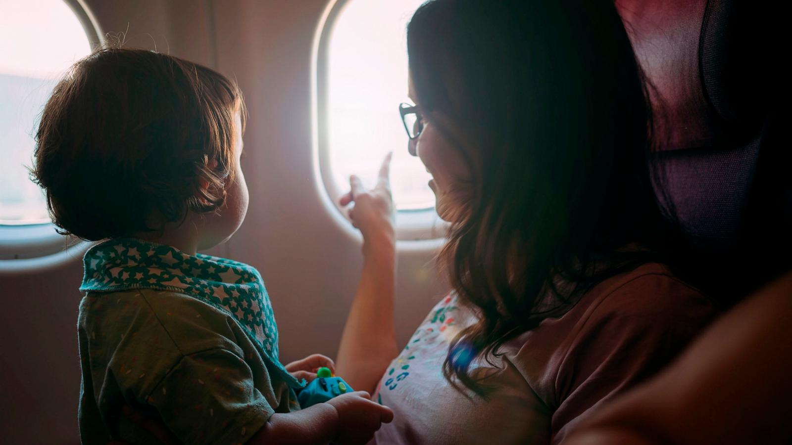 PHOTO: The best way to secure a baby on a flight.