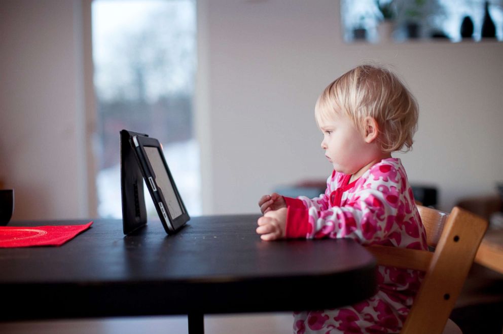 PHOTO: A baby looks at a digital tablet in this undated stock photo.