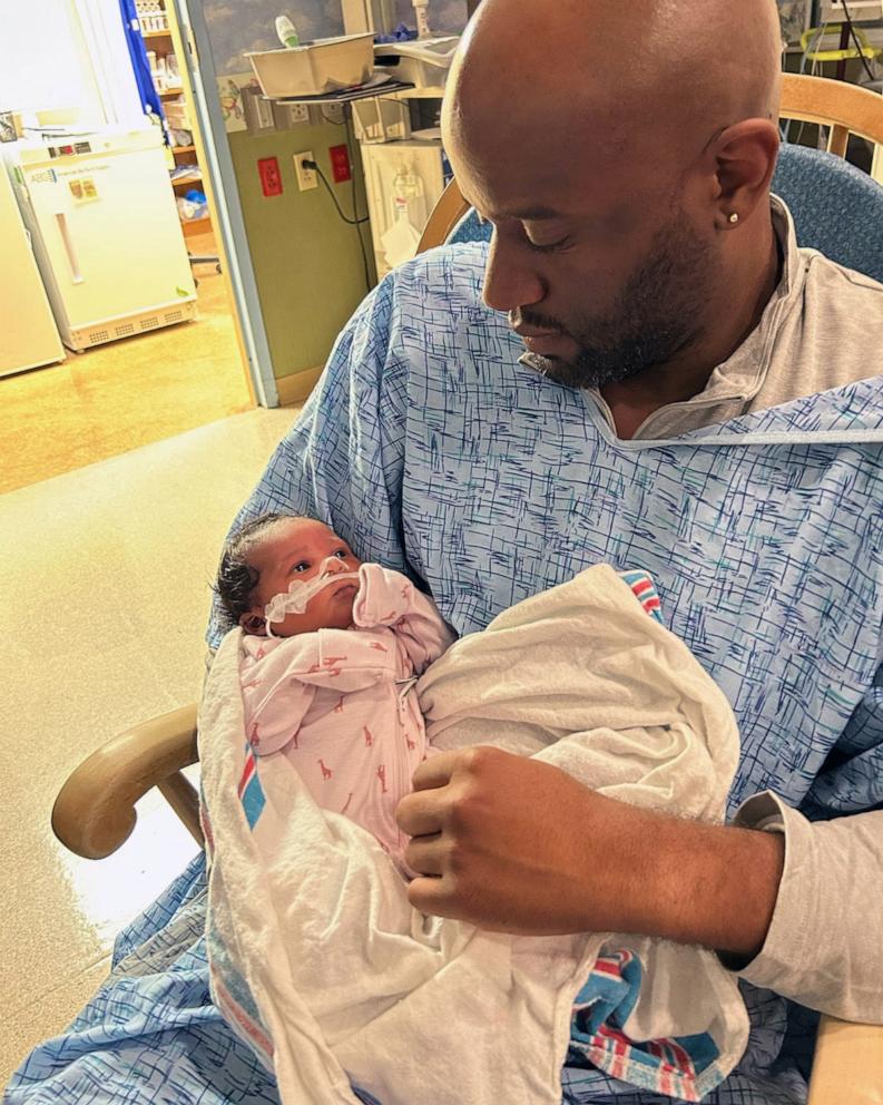 PHOTO: Edgar Patton is pictured with his newborn daughter Emery.