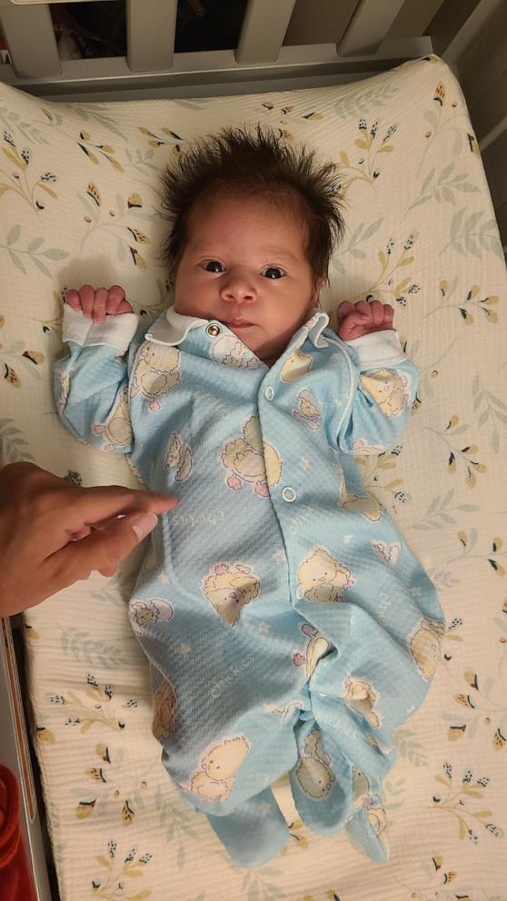 PHOTO: Felicia Fisher's daughter Sequoia in a blue onesie from Tayler Livengood.