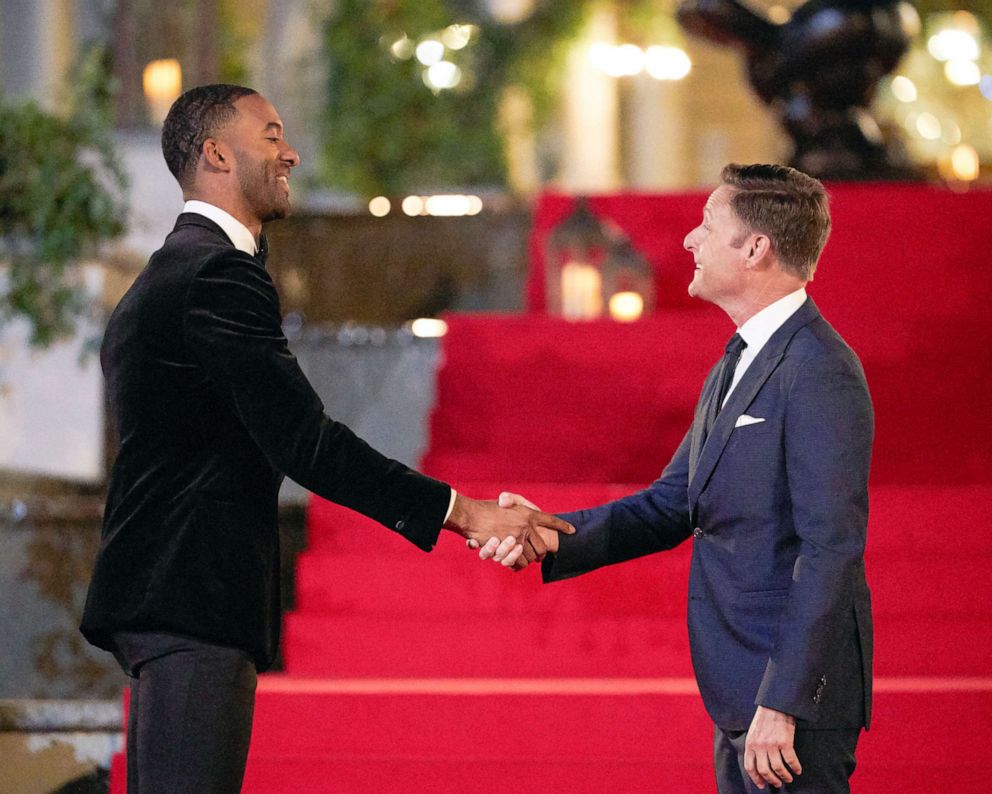 PHOTO: Matt James, the star of ABC's hit romance reality series "The Bachelor," shakes hands with Chris Harrison on the season premiere episode of the show airing Jan. 4, 2021.
