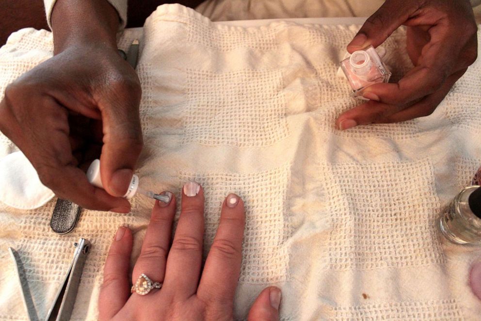 PHOTO: Omar Brown set up a nail salon and made brunch for Kelli Van Harn on April 18, 2020, in Southfield, Mi.