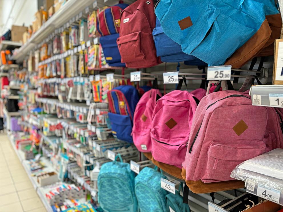 PHOTO: Stock photo of school backpacks at stationery shop.