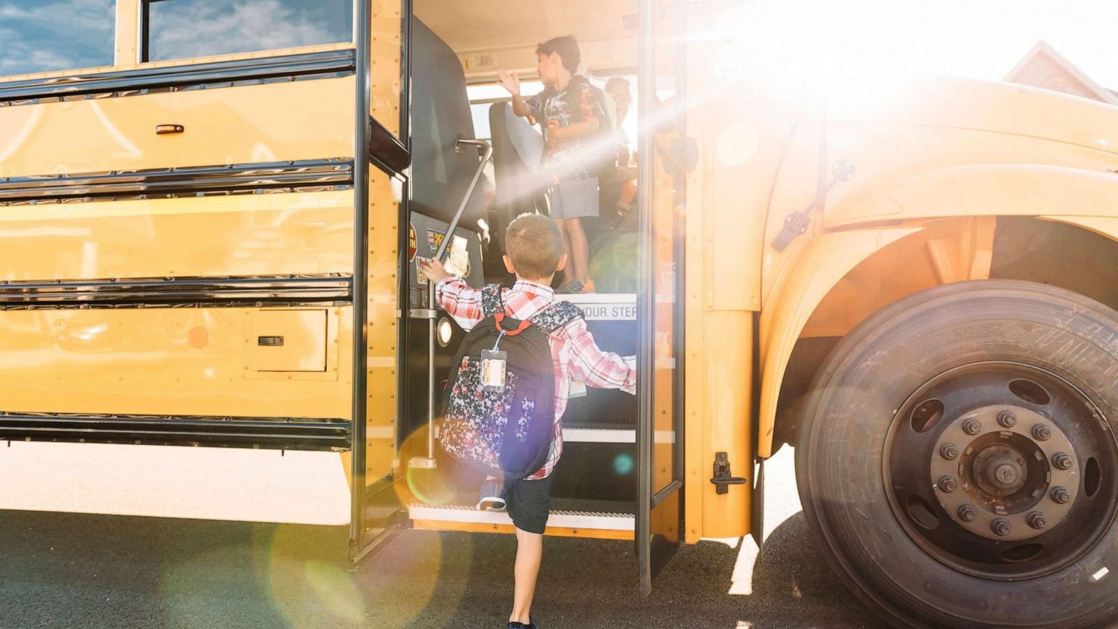 PHOTO: Students board a school bus in New Lennox, Ill. in an undated stock image.